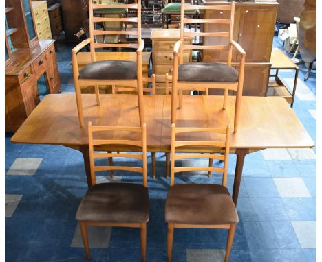 A 1970s MacIntosh Extending Dining Table on Turned Supports together with Six Scriber Ladder Back Chairs, Table 235cms by 92c