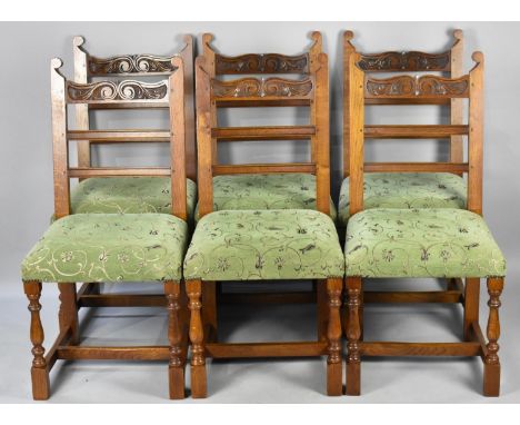 A Set of Six Oak Framed Ladder Backed Chairs