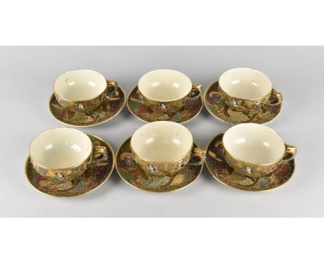 A Japanese Satsuma Tea Set Comprising Six Cups and Saucers Decorated with Figures and Enriched with Gilt (Some Various Condit