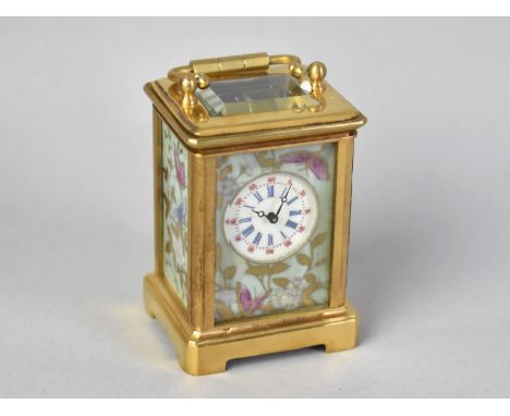 A Miniature Gilt Brass Plate Sevres Style Carriage Clock with Decorated Porcelain Panels, No Key but Working Order, 6.5cm Hig