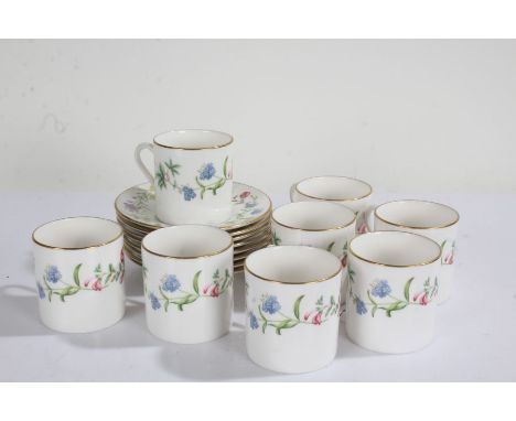 Royal Worcester porcelain coffee cups and saucers, comprising of eight each (one saucer AF), all with floral decoration (16)