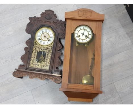 2 wall clocks includes An early 20th century wall clock plus one other both with key and pendulum