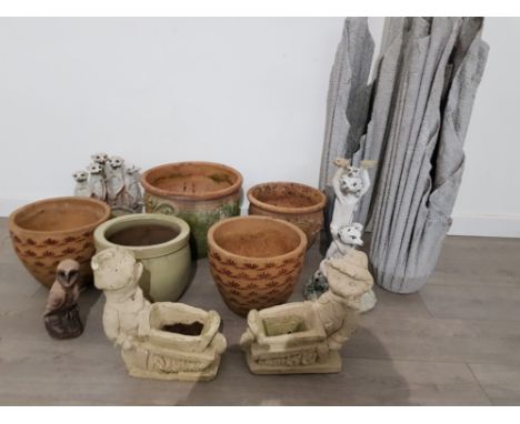 A lot of garden planters and sculptures to include meerkats,a barn owl and ceramic pots