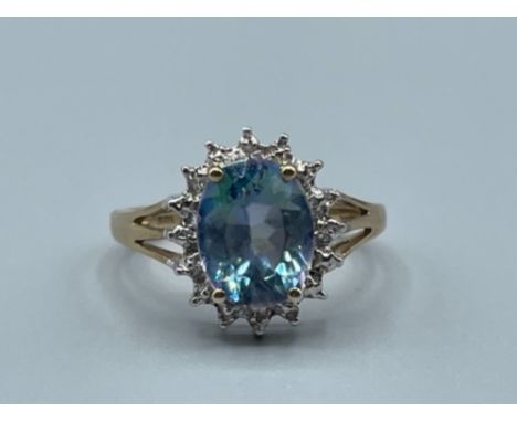 9ct gold ring with oval mystic topaz stone 3.18g size O