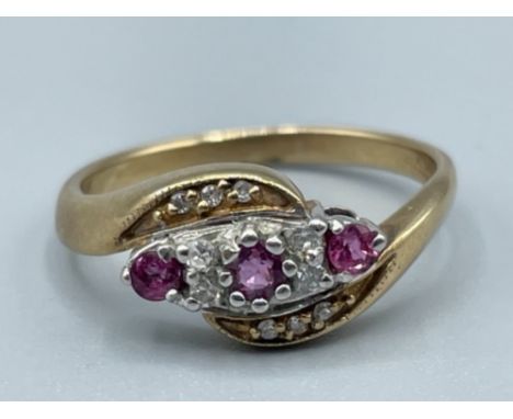 Ladies 9ct gold ruby and diamond cluster ring size N 2.55g