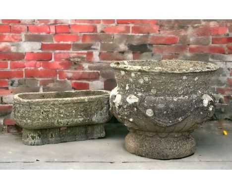 TWO COMPOSITION PLANTERS, small Roman style oval trough, 50w x 29h x 22cms d together with urn shaped planter decorated with 