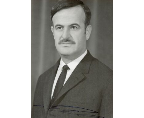 Hafez al-Assad signed 6x4 black and white photo. Hafez al-Assad  (6 October 1930 - 10 June 2000) was a Syrian statesman and m