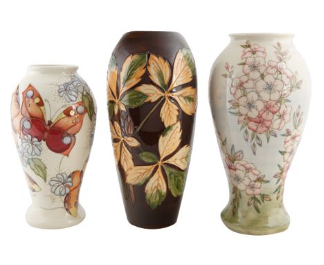 GROUP OF THREE VASES, MOORCROFT, STOKE-ON-TRENTthe group of three Florian vases of various designs, shapes and sizes each wit