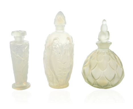 GROUP OF THREE SABINO GLASS PERFUME BOTTLEScomprising: a) A SABINO GLASS "LA RONDE FLEURIE" PERFUME BOTTLE, after 1931 design