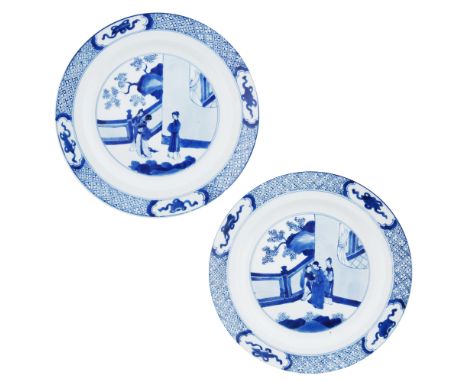 PAIR OF CHINESE XIANFENG PORCELAIN PLATESeach circular with lifted edges, the rim featuring a lattice motif with a cloud cart