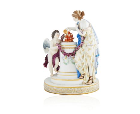 MEISSEN PORCELAIN ALLEGORICAL FIGURAL GROUPmodelled as an allegorical scene, a goddess stands the right of the plinth, dresse