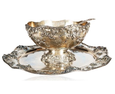 THEODORE B. STARR LARGE SILVER PUNCH BOWLthree piece punch bowl silver service, each with a repousse grapevine motif, each ma