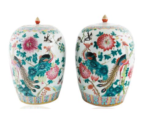 PAIR OF CHINESE FAMILLE ROSE ' GINGER JARSeach of bulbous form with conforming covers with pointed finials, decorated with na