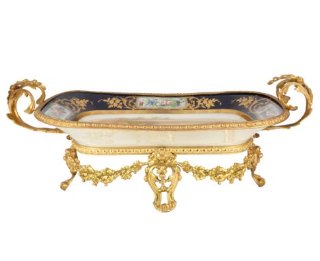 FRENCH SEVRES-STYLE PORCELAIN BLEU NOUVEAU TRAYrectangular form with rounded edges, the porcelain tray featuring a garden sce