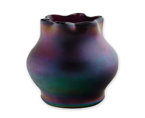 TIFFANY STUDIOS FAVRILE GLASS BOWLsquat rounded form with a frilled rim, with a deep purple and iridescent ground; height: 11