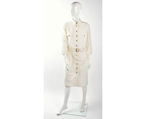 A cream Burberry 3/4 length shirt dress , two-toned waist belt with gold toned oblong fastener, gold-tone buttons with burber