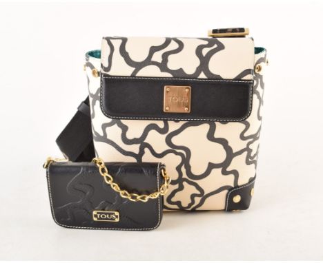 Tous monogrammed bag, front flap with gold tone Tous logo, magnetic snap fastener, turquoise lined interior with two pockets 