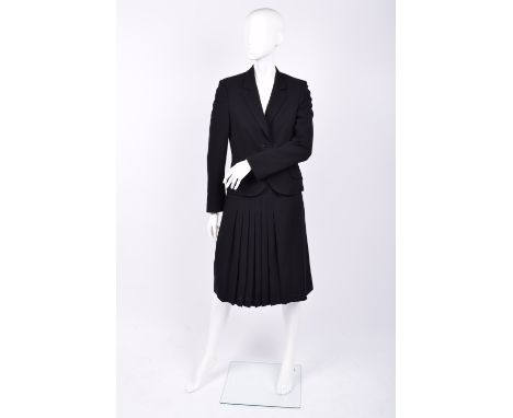A Jaeger two-piece black wool suit, jacket with 2-button fastening to front, two buttons to either sleeve cuff, pocket to eit