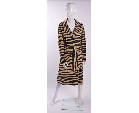 A Moschino Cheap and Chic suede tiger print coat , 3/4 length, black button fastening to front, two pockets to either side, t