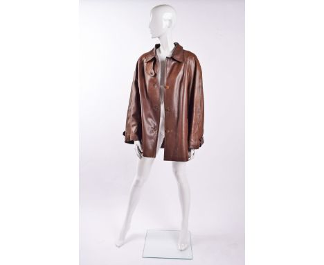 Hermes brown leather jacket , deep back yoke with button fastening, two pockets either side with button fastenings,buttons em