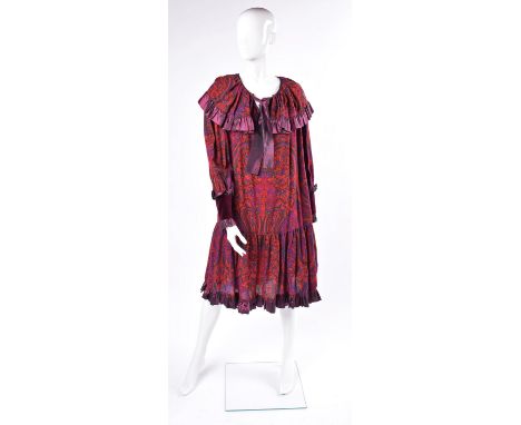 Yves Saint Laurent vintage paisley print smock dress , in shades of red, purple and green with purple taffeta ruffle trim to 