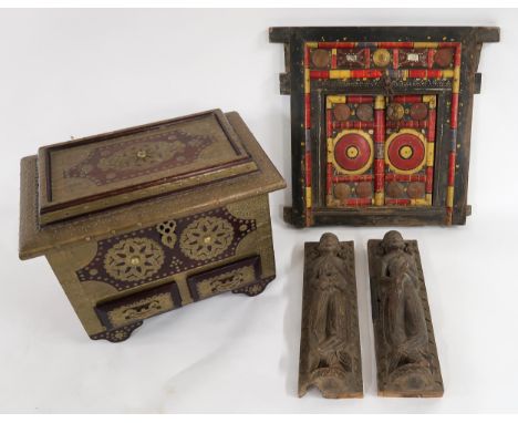 A 20TH CENTURY INDIAN HARDWOOD AND BRASS MOUNTED CHEST with hinged top above two short drawers, 36cm high x 46cm wide x 31cm 