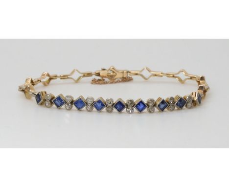 A VINTAGE SAPPHIRE AND DIAMOND BRACELET mounted throughout in yellow and white metal, set with square cut sapphires and diamo