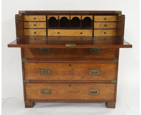 AN EARLY 20TH CENTURY TEAK AND BRASS BOUND SECRETAIRE CAMPAIGN CHEST, with fitted fall front secretaire drawer above three fu