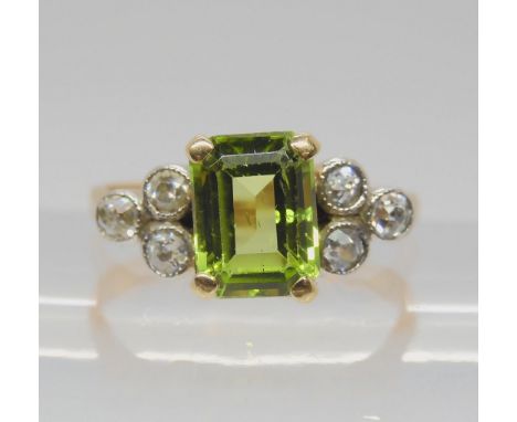 A PERIDOT AND DIAMOND BRACELET &amp; MATCHING RING the yellow metal expanding bracelet is stamped London made and set with th