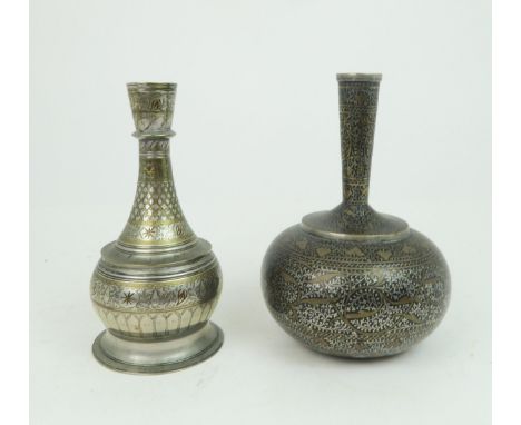 A BIDRI WHITE METAL OVERLAID BOTTLE VASE decorated with scrolling foliage, 23.5cm high and another decorated with scale patte