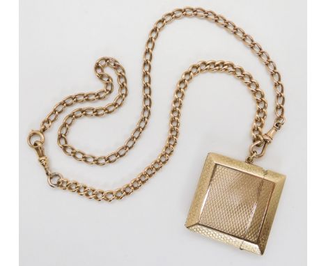 A 9CT GOLD VESTA ON A DOUBLE FOB CHAIN vesta with all over engine turned engraving, hallmarked Birmingham 1925-26, dimensions