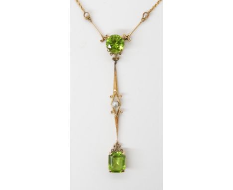 A 15CT GOLD PERIDOT AND PEARL PENDANT &amp; EARRINGS the two peridots in the pendant are a good deep colour the round cut is 