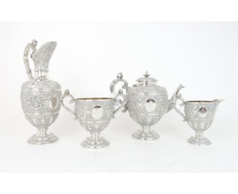 A MATCHED VICTORIAN SCOTTISH SILVER CELLINI PATTERN FOUR PIECE TEA SERVICE comprising a tea pot, ewer, twin handled sugar bow