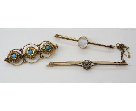 THREE VINTAGE BROOCHES a 9ct gold moonstone bar brooch, moonstone approx 9mm x 7.6mm, length 5cm, weight 2.8gms, a yellow and