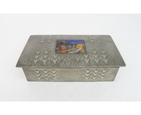 A CIGARETTE BOX IN THE STYLE OF&nbsp;LIBERTY &amp; CO TUDRIC&nbsp;PEWTER with embossed Art Nouveau design and enamelled panel