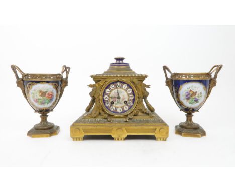 A RICHARD AND CO FRENCH MANTLE CLOCK the ormolu case with lion head handles, swags of laurel, and&nbsp; acanthus leaf decorat