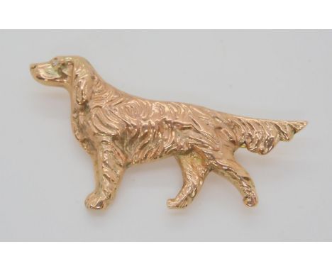 A 9CT ROSE GOLD RED SETTER DOG BROOCH the eye set with a diamond, this item was made bespoke. Dimensions 5.8cm x 3cm, weight 