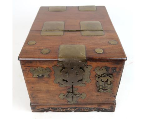 A CHINESE HARDWOOD DRESSING TABLE CHESTfitted with brass mounts, hinged, mirror, drawers and fitted with six internal drawers