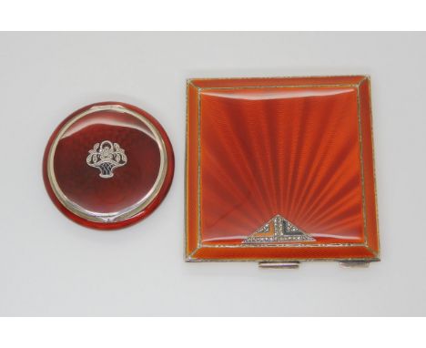 TWO ENAMELLED POWDER COMPACTS a deep orange guilloche enamelled silver square compact with triangular enamel and marcasite mo