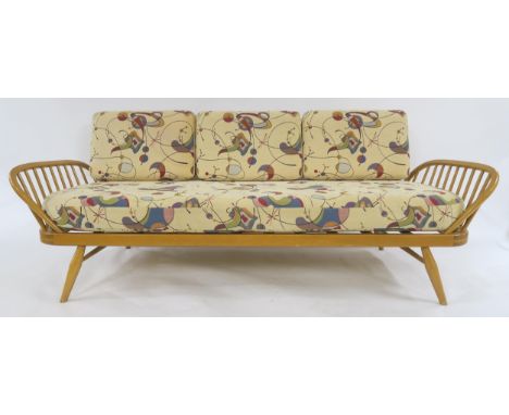 A MID 20TH CENTURY ERCOL ELM AND BEECH FRAMED DAY BED with original Ercol cushions,&nbsp;77cm high x 207cm wide x 84cm deep C