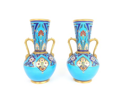 ATTRIBUTED TO CHRISTOPHER DRESSER (1834-1904) FOR MINTON &amp; CO A pair of twin handled Aesthetic Movement&nbsp;vases, the t