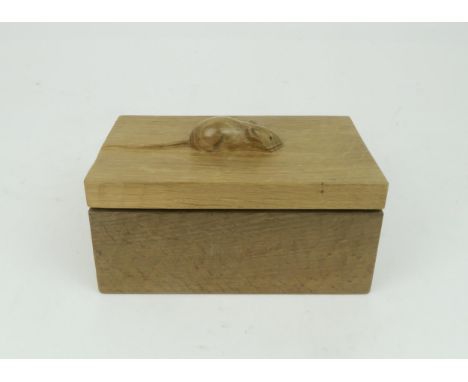 ROBERT MOUSEMAN THOMPSON OF KILBURN a rectangular shape adzed oak trinket box and cover, the cover with carved mouse handle, 