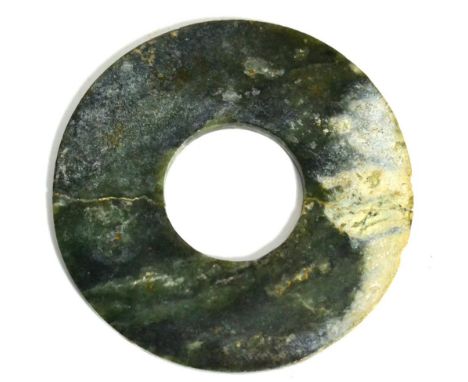 A Chinese jade bi-disk of plain circular form, 14cm diameter 