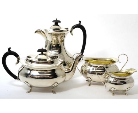 A silver four piece tea service, Joseph Gloster Ltd, Birmingham, 1925, plain oval form on pad feet, the hot water pot 23cm hi