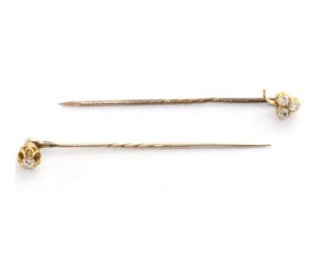 A diamond set clover stick pin, three old cut diamonds in a clover arrangement, total estimated diamond weight 0.15 carat app