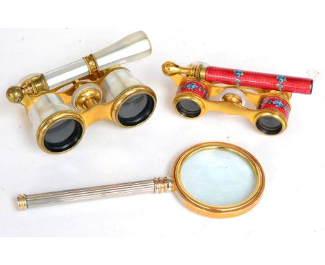 ^ A set of mother-of-pearl mounted gilt metal opera glasses, early 20th century, with eyepieces inscribed ''W. ECKER LUCERNE'