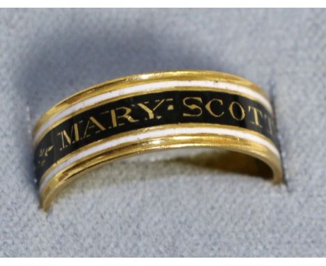 A 22 carat gold George III mourning ring, a black enamel band picked out to read 'MARY.SCOTT.OB:6 MAR:1796.AE:81', between wh