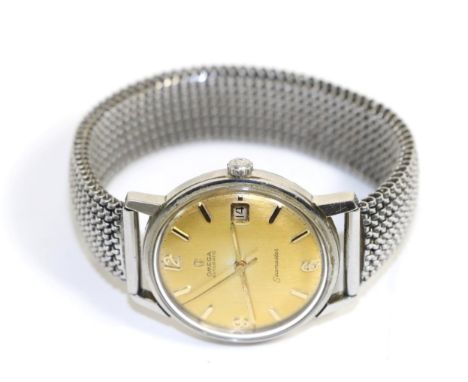 A stainless steel automatic calendar centre seconds wristwatch, signed Omega, model: Seamaster, 1965, (calibre 562) lever mov