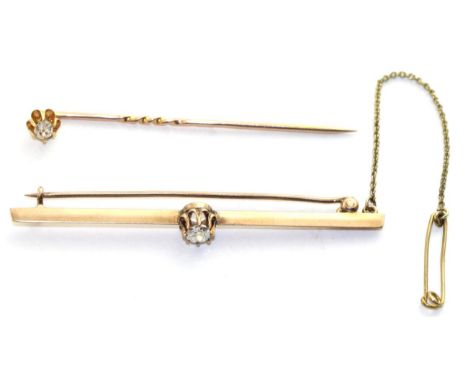 A diamond bar brooch, an old cut diamond in a claw setting to a knife edge bar, estimated diamond weight 0.20 carat approxima