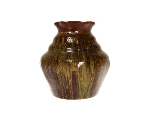 A LINTHORPE POTTERY VASE, a known Christopher Dresser design, with streaky glaze over a brown ground with geometric sgraffito